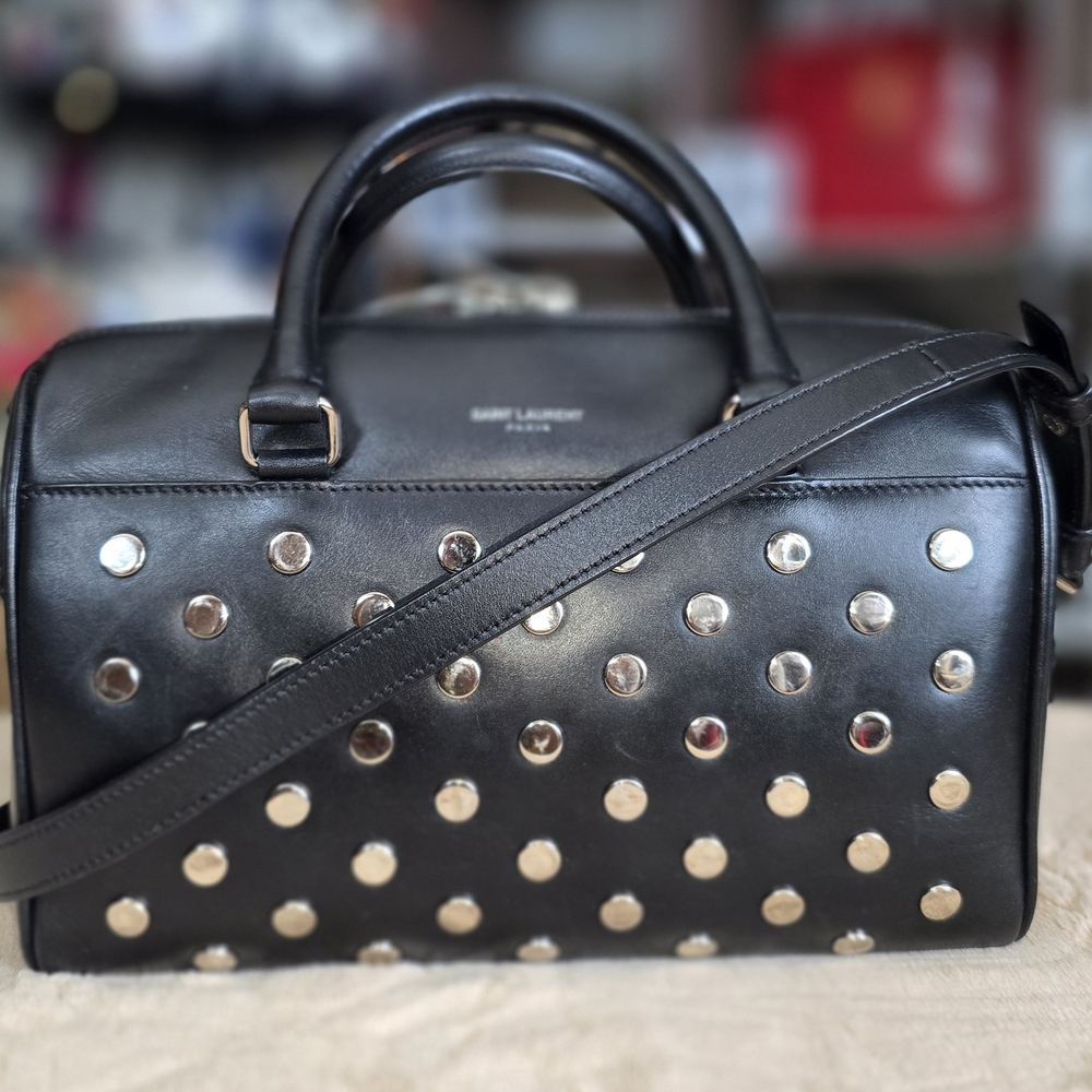 Saint Laurent Classic Baby Duffle Studded Handbag in Black Leather
